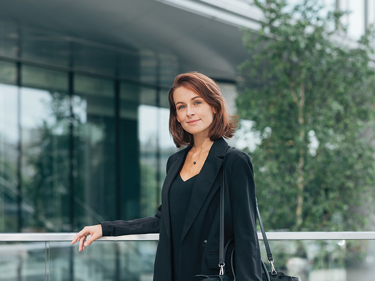 Women investor in black suit taking control of her money